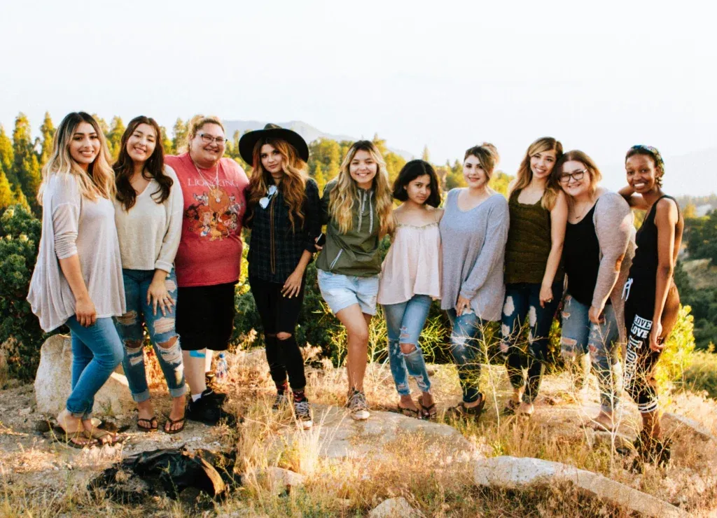 Group of diverse women outdoors, smiling together