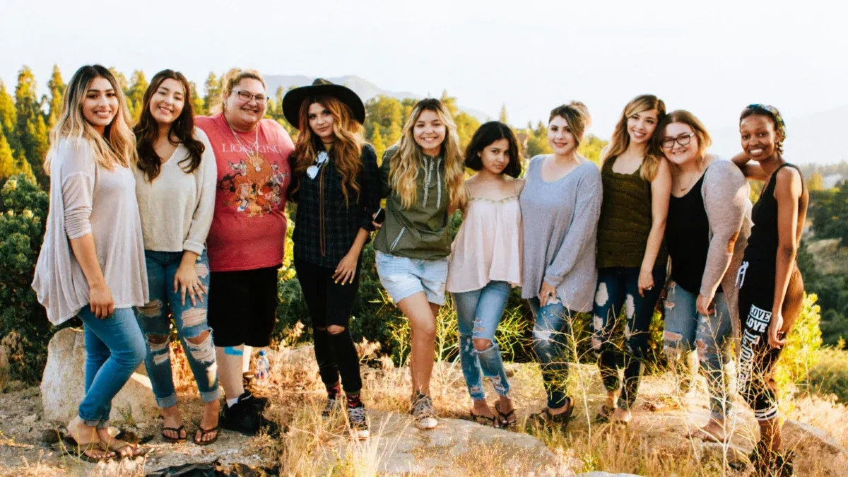 Group of diverse women outdoors, smiling together