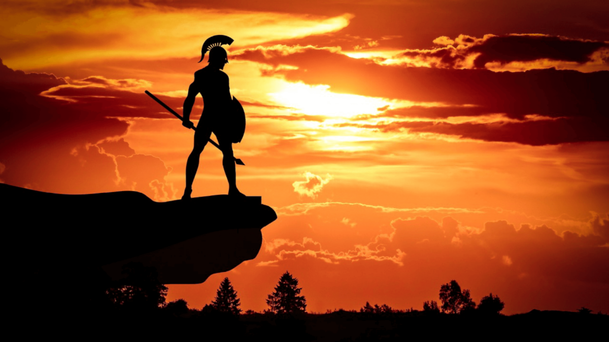 Spartan warrior silhouette at sunset