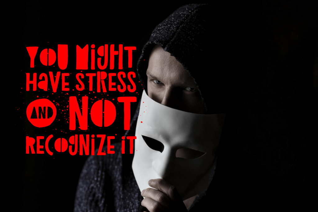 Masked person warns about hidden stress.
