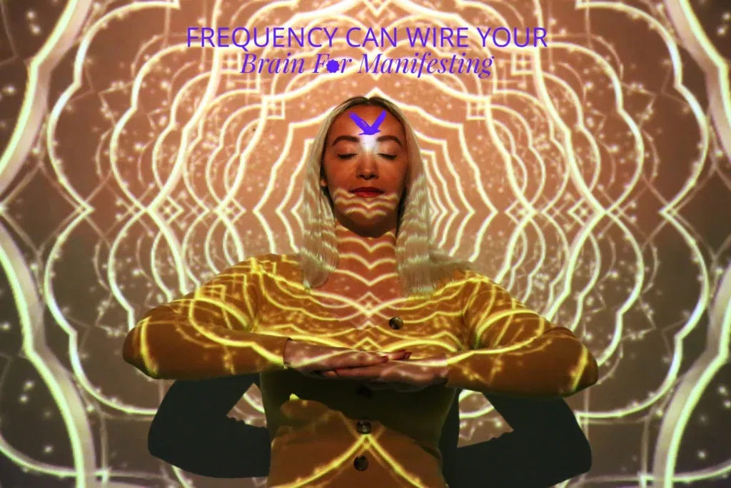 Person meditating with psychedelic projections.