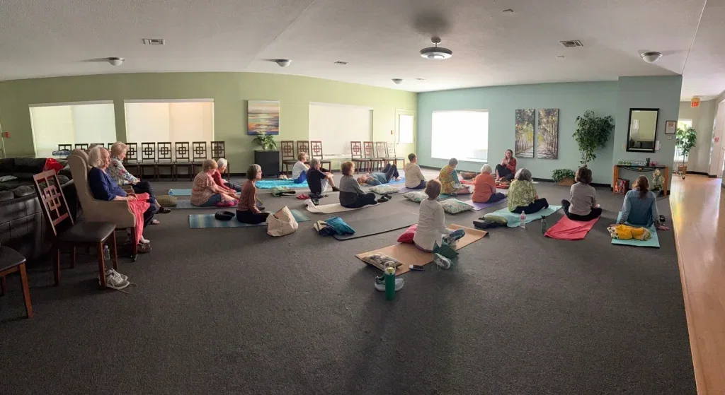 Wide view of a community group sound bath in progress