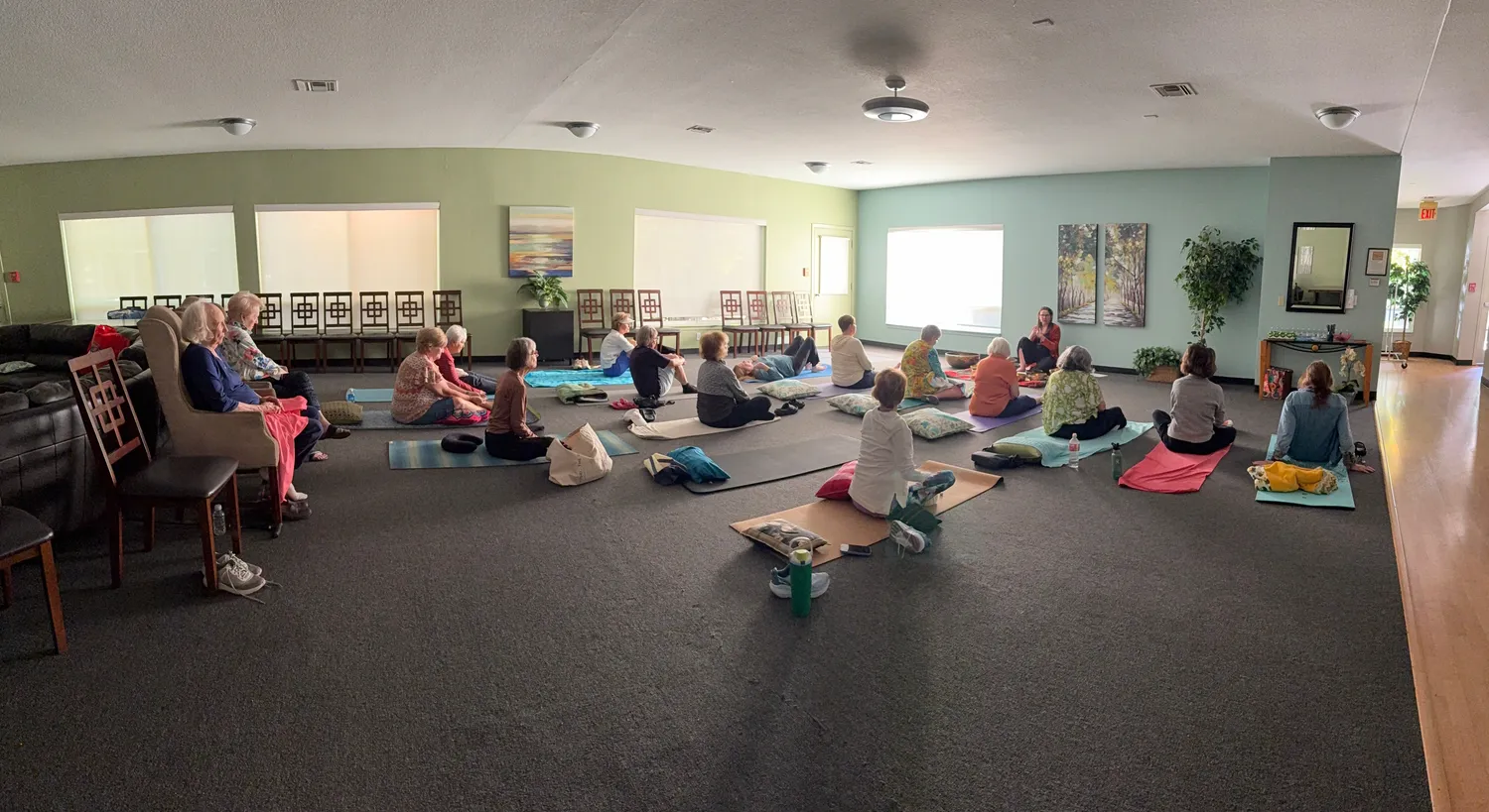 Wide view of a community group sound bath in progress